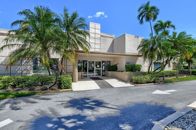 9214 Flynn Cir # 6, Boca Raton, FL 33496 - view of property with fence and concrete driveway