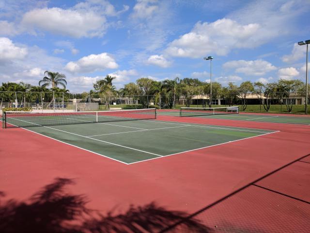 9214 Flynn Cir # 6, Boca Raton, FL 33496 - view of tennis court featuring fence and community basketball court