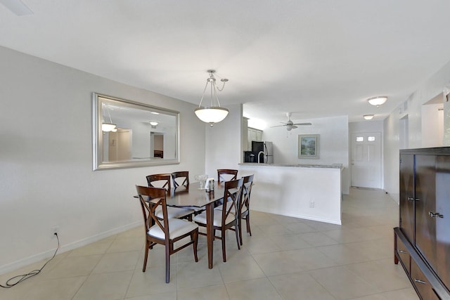 9214 Flynn Cir # 6, Boca Raton, FL 33496 - dining area with baseboards, a ceiling fan, and light tile patterned floors