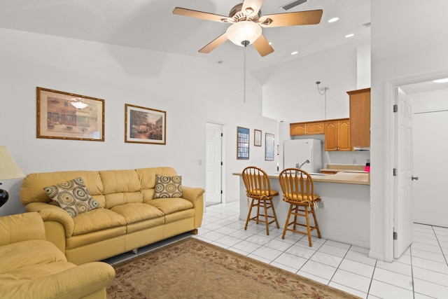 460 NW Turin Ct, Port Saint Lucie, FL 34986 - living area featuring high vaulted ceiling, a ceiling fan, light tile patterned floors, and recessed lighting