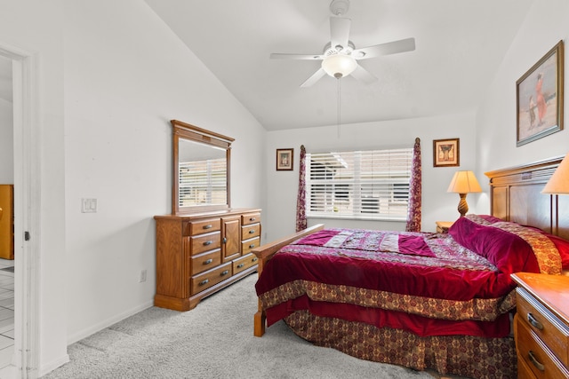 460 NW Turin Ct, Port Saint Lucie, FL 34986 - bedroom with multiple windows, carpet, vaulted ceiling, a ceiling fan, and baseboards