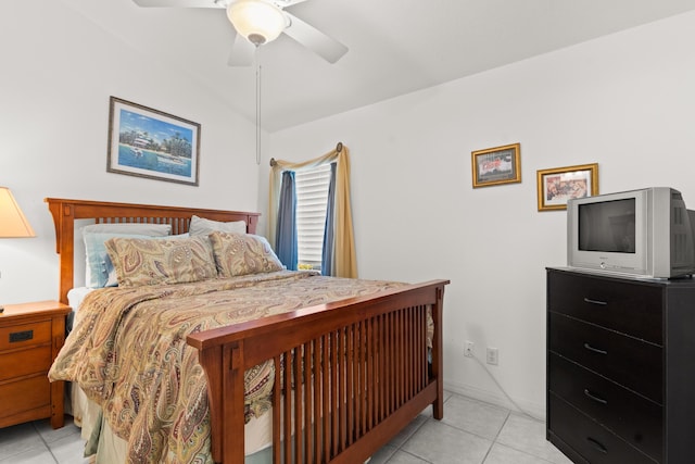 460 NW Turin Ct, Port Saint Lucie, FL 34986 - bedroom with light tile patterned floors, vaulted ceiling, and a ceiling fan