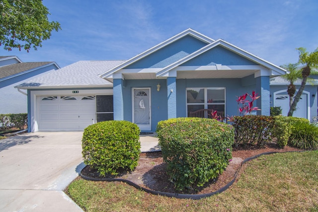 460 NW Turin Ct, Port Saint Lucie, FL 34986 - single story home with an attached garage, concrete driveway, stucco siding, and a shingled roof