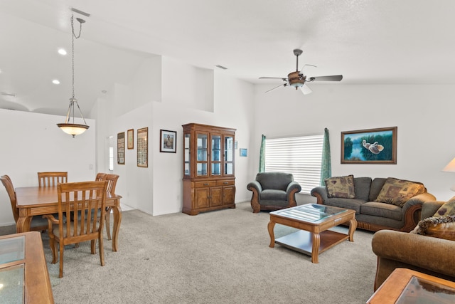 460 NW Turin Ct, Port Saint Lucie, FL 34986 - living area with high vaulted ceiling, light colored carpet, and a ceiling fan