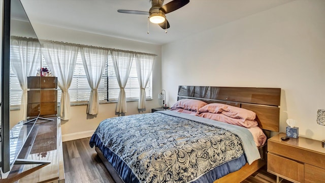 6320 Wedgewood Ter Unit 6320, Tamarac, FL 33321 - bedroom featuring baseboards, ceiling fan, and wood finished floors