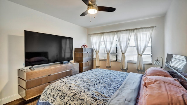 6320 Wedgewood Ter Unit 6320, Tamarac, FL 33321 - bedroom with baseboards, dark wood finished floors, and ceiling fan