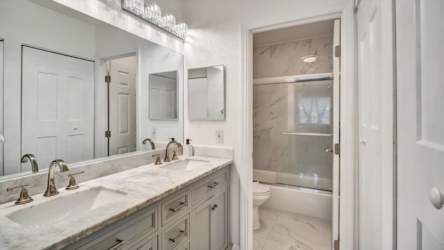 6320 Wedgewood Ter Unit 6320, Tamarac, FL 33321 - bathroom with a sink, bath / shower combo with glass door, toilet, and marble finish floor