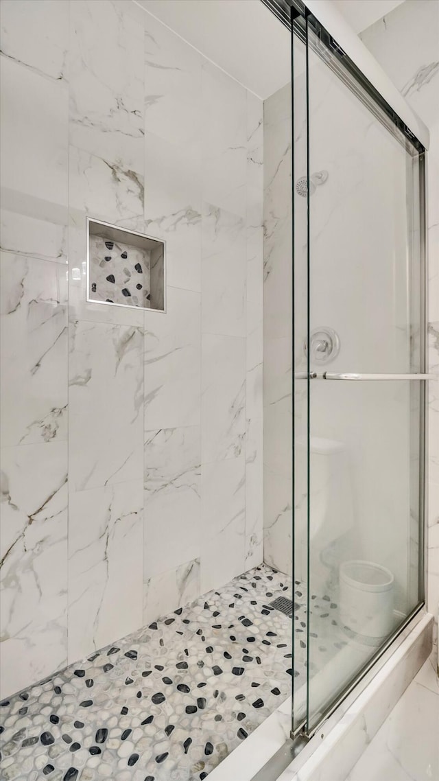 6320 Wedgewood Ter Unit 6320, Tamarac, FL 33321 - bathroom featuring a marble finish shower