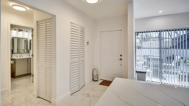 6320 Wedgewood Ter Unit 6320, Tamarac, FL 33321 - foyer entrance with baseboards, recessed lighting, and marble finish floor