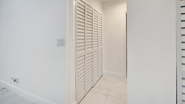 6320 Wedgewood Ter Unit 6320, Tamarac, FL 33321 - bathroom featuring baseboards, marble finish floor, and a closet