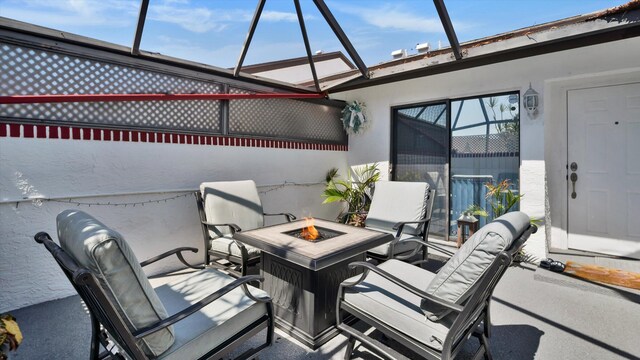 6320 Wedgewood Ter Unit 6320, Tamarac, FL 33321 - view of patio with a lanai and an outdoor fire pit