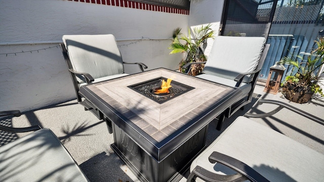 6320 Wedgewood Ter Unit 6320, Tamarac, FL 33321 - view of patio / terrace with a fire pit