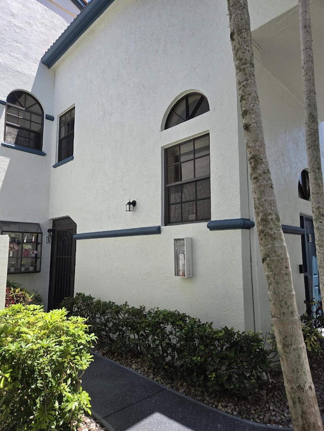 view of property exterior with stucco siding