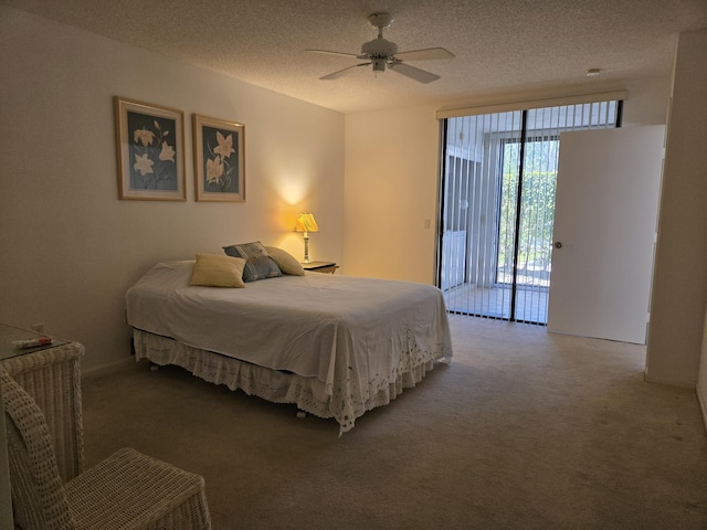 5135 Floria Dr Unit G, Boynton Beach, FL 33437 - carpeted bedroom with access to outside, ceiling fan, and a textured ceiling