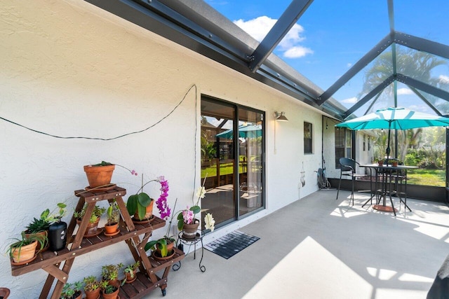 10124 182nd Ct S, Boca Raton, FL 33498 - view of patio / terrace featuring glass enclosure