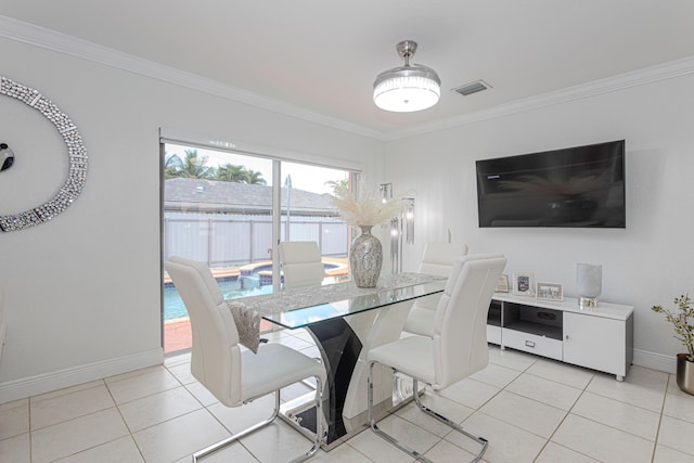 22031 SW 127th Ave, Miami, FL 33170 - dining space featuring crown molding, baseboards, and light tile patterned flooring