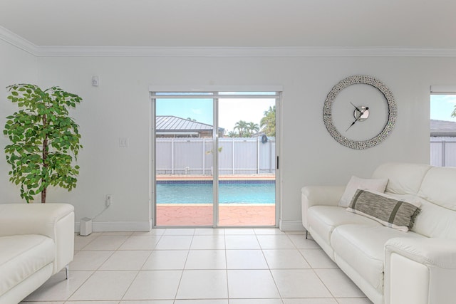 22031 SW 127th Ave, Miami, FL 33170 - living area featuring crown molding, baseboards, and light tile patterned floors