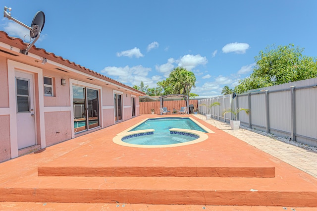22031 SW 127th Ave, Miami, FL 33170 - view of pool with an in-ground hot tub, a fenced backyard, and a patio