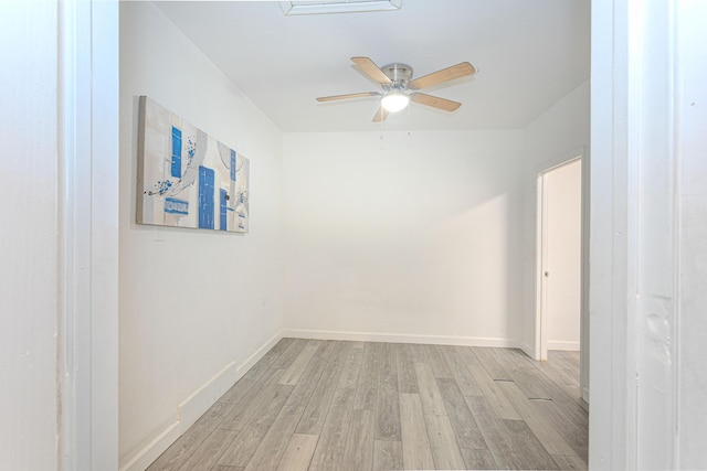 22031 SW 127th Ave, Miami, FL 33170 - empty room with light wood-style flooring, ceiling fan, and baseboards