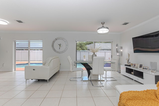 22031 SW 127th Ave, Miami, FL 33170 - dining room with crown molding, light tile patterned flooring, and baseboards