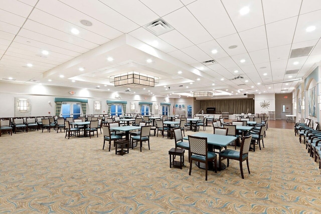 carpeted dining space featuring recessed lighting and visible vents