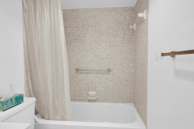 full bath with toilet and shower / tub combo