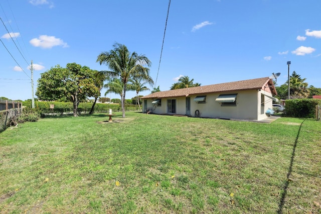 view of yard with fence