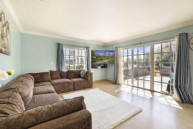 503 Vision Ct, Palm Beach Gardens, FL 33418 - living room featuring crown molding and tile patterned flooring