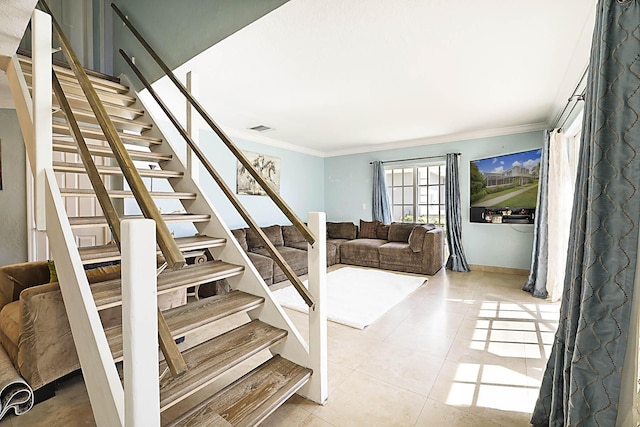 503 Vision Ct, Palm Beach Gardens, FL 33418 - stairway featuring crown molding, tile patterned flooring, and visible vents