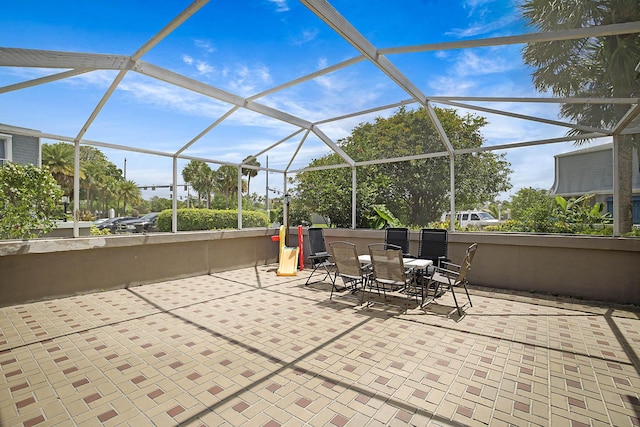 503 Vision Ct, Palm Beach Gardens, FL 33418 - view of patio with outdoor dining area and a lanai