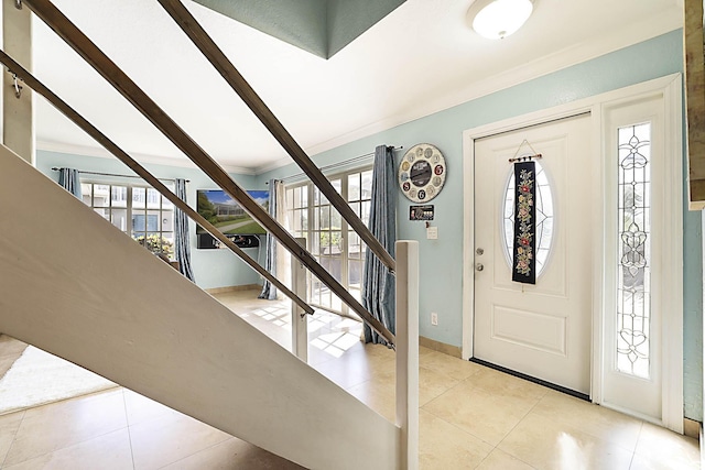 503 Vision Ct, Palm Beach Gardens, FL 33418 - tiled entrance foyer featuring stairs, baseboards, and ornamental molding