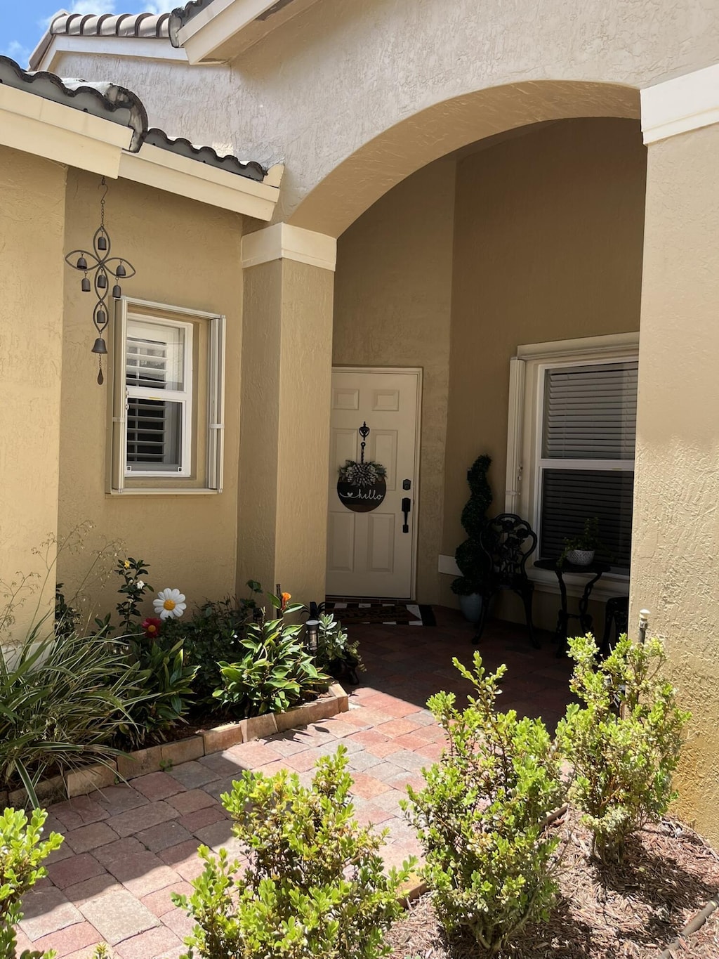 5112 Victoria Cir, West Palm Beach, FL 33409 - property entrance with stucco siding
