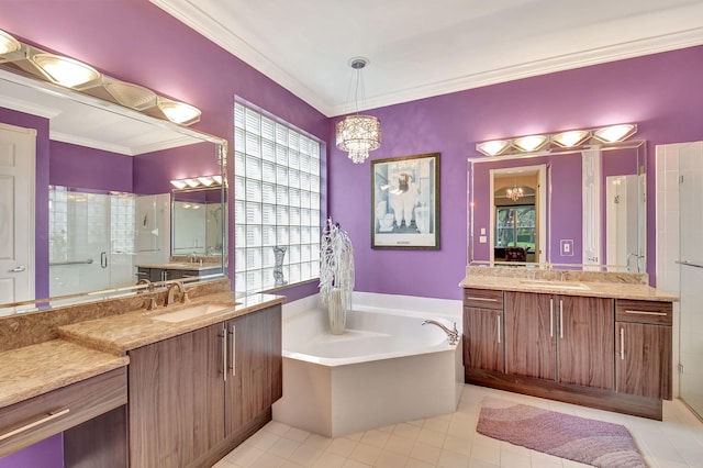 bathroom featuring a sink, tile patterned flooring, crown molding, and a garden tub