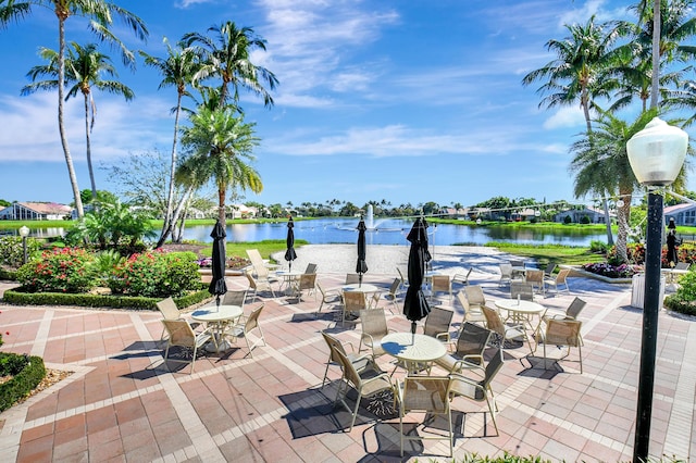view of patio featuring a water view
