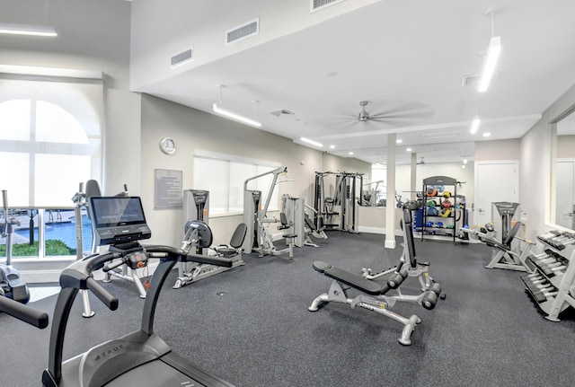 workout area with visible vents and baseboards