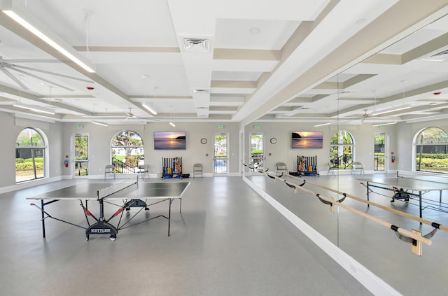 playroom featuring plenty of natural light, ceiling fan, coffered ceiling, and visible vents