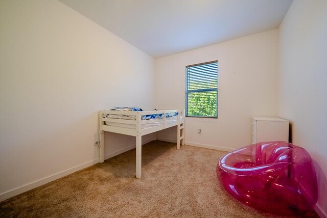 8633 Via, Mar Rosso, Lake Worth, FL 33467 - carpeted bedroom with baseboards and vaulted ceiling