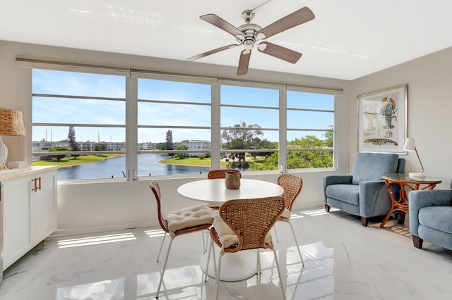 4008 Farnham N, Deerfield Beach, FL 33442 - sunroom / solarium featuring plenty of natural light, marble tiled floors, and a water view