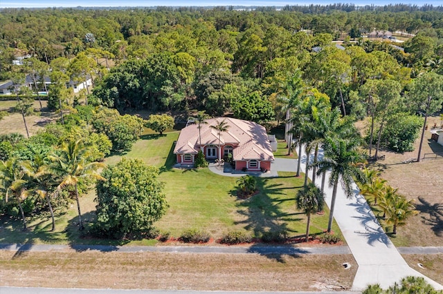 14844 Tangerine Blvd, The Acreage, FL 33470 - aerial view featuring a wooded view