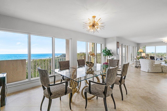 4001 N Ocean Blvd Unit 1108, Boca Raton, FL 33431 - dining area featuring a chandelier and plenty of natural light