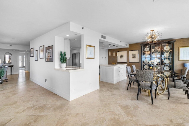 4001 N Ocean Blvd Unit 1108, Boca Raton, FL 33431 - dining area with baseboards and a chandelier