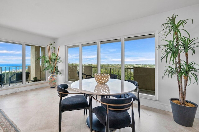 4001 N Ocean Blvd Unit 1108, Boca Raton, FL 33431 - dining area featuring baseboards