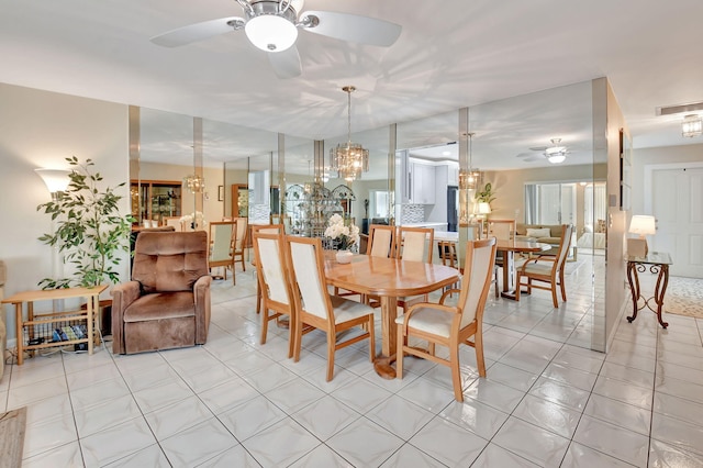5154 Privet Pl Unit A, Delray Beach, FL 33484 - dining room with ceiling fan and a chandelier