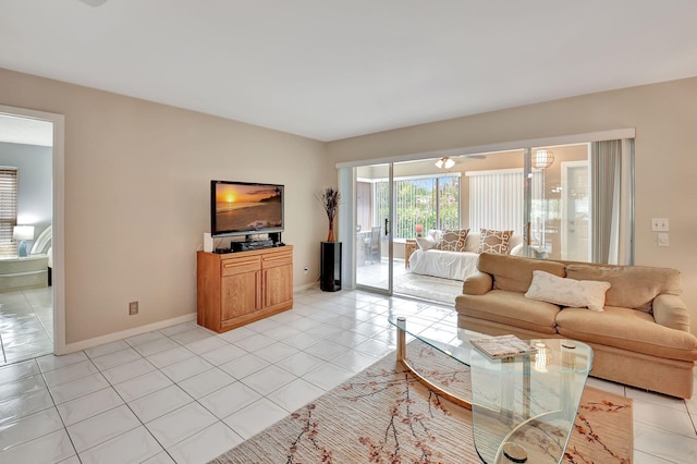 5154 Privet Pl Unit A, Delray Beach, FL 33484 - living room featuring light tile patterned floors and baseboards