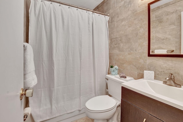 5154 Privet Pl Unit A, Delray Beach, FL 33484 - full bathroom with tile walls, vanity, shower / bath combo with shower curtain, and backsplash