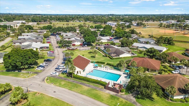 birds eye view of property with a residential view