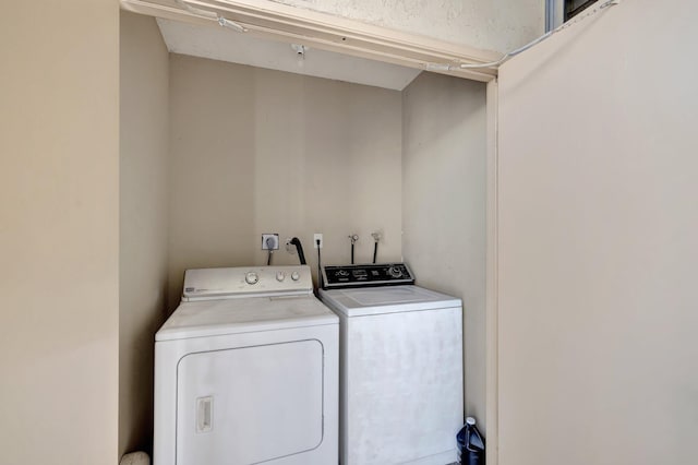 3301 NW 47th Ter Unit 410, Lauderdale Lakes, FL 33319 - laundry area with separate washer and dryer and laundry area