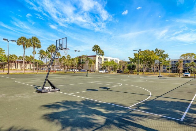 3301 NW 47th Ter Unit 410, Lauderdale Lakes, FL 33319 - view of sport court with fence and community basketball court