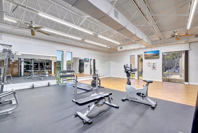 3301 NW 47th Ter Unit 410, Lauderdale Lakes, FL 33319 - exercise room featuring baseboards, a ceiling fan, and visible vents