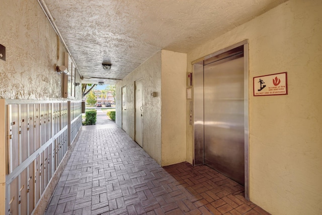 3301 NW 47th Ter Unit 410, Lauderdale Lakes, FL 33319 - corridor featuring elevator